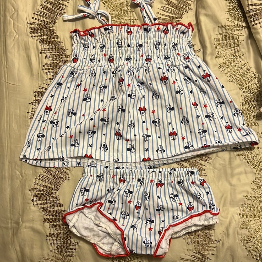 Selling this beautiful minnie mouse fourth of july 2 piece set. Worn once.